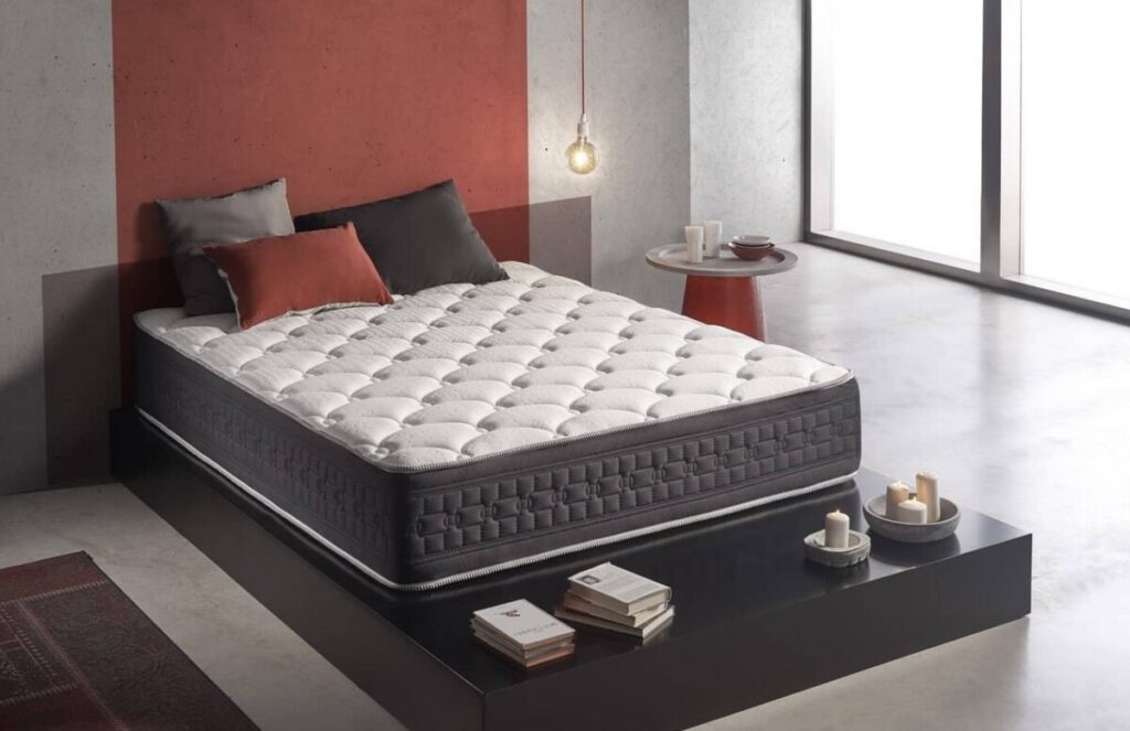 Dormitorio moderno con cama matrimonial, colchón ortopédico y decoración minimalista